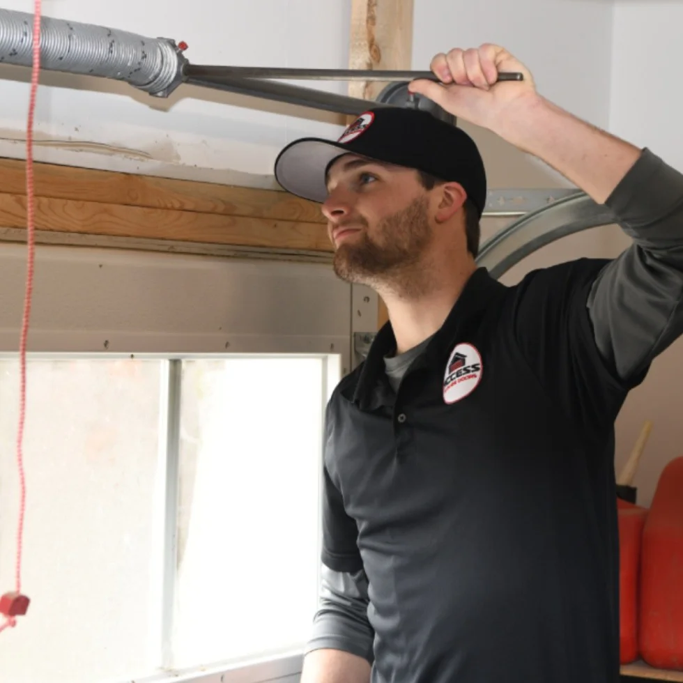 Man repairing a garage door
